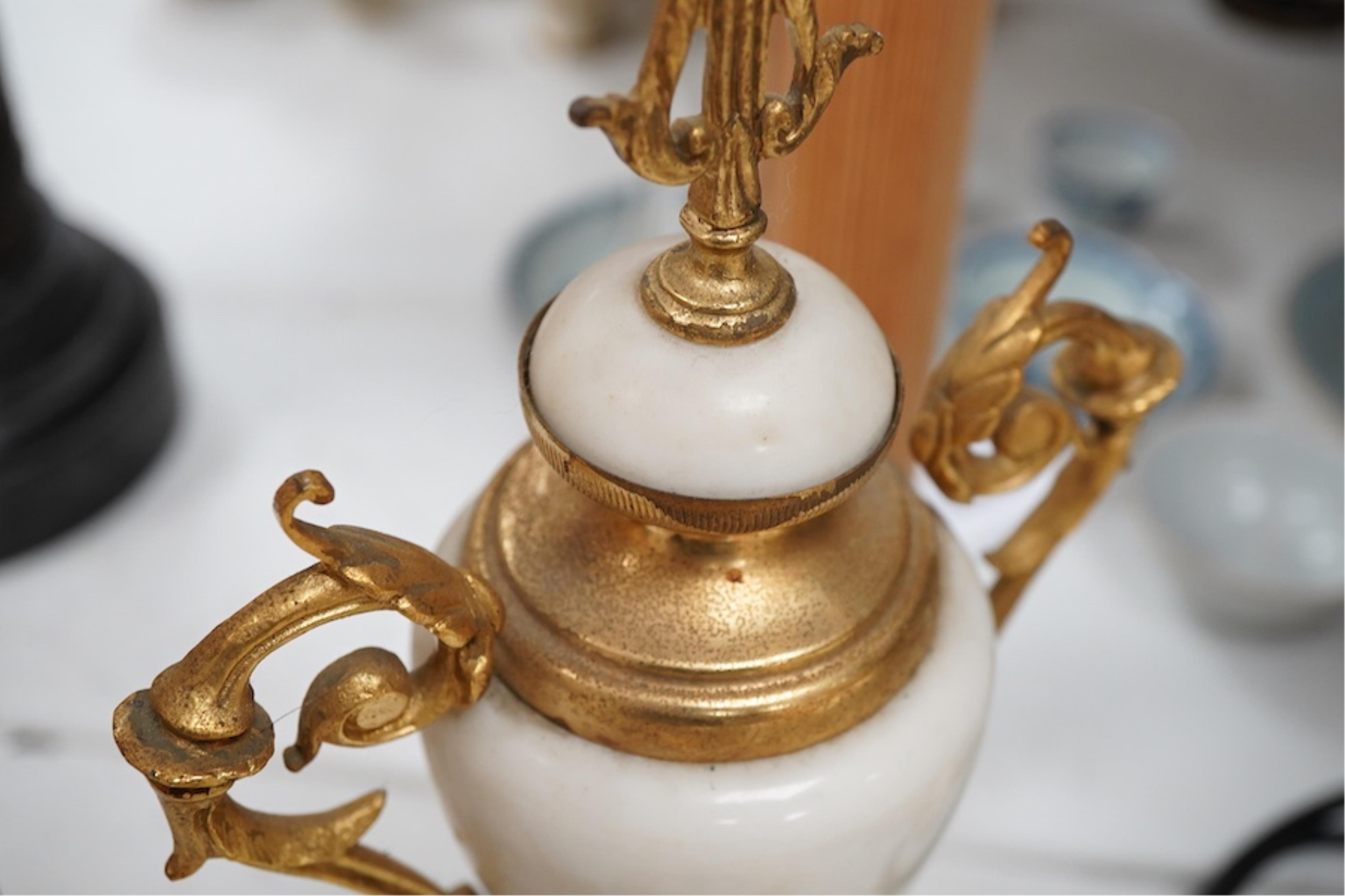 A late 19th century French gilt metal mounted clock garniture, 41cm